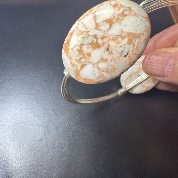 Silver wired metal bracelet with two oval brown swirled stones - Picture 6 of 8